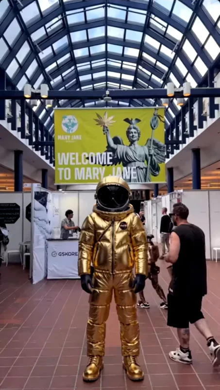 The gold HEADS astronaut standing in the hall at Mary Jane Berlin