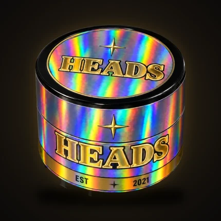 A HEADS Est. 2021 jar wrapped in rainbow holographic foil